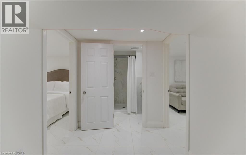 Hall featuring light marble finish flooring and recessed lighting - 569 Stirling Avenue S, Kitchener, ON - Indoor Photo Showing Other Room