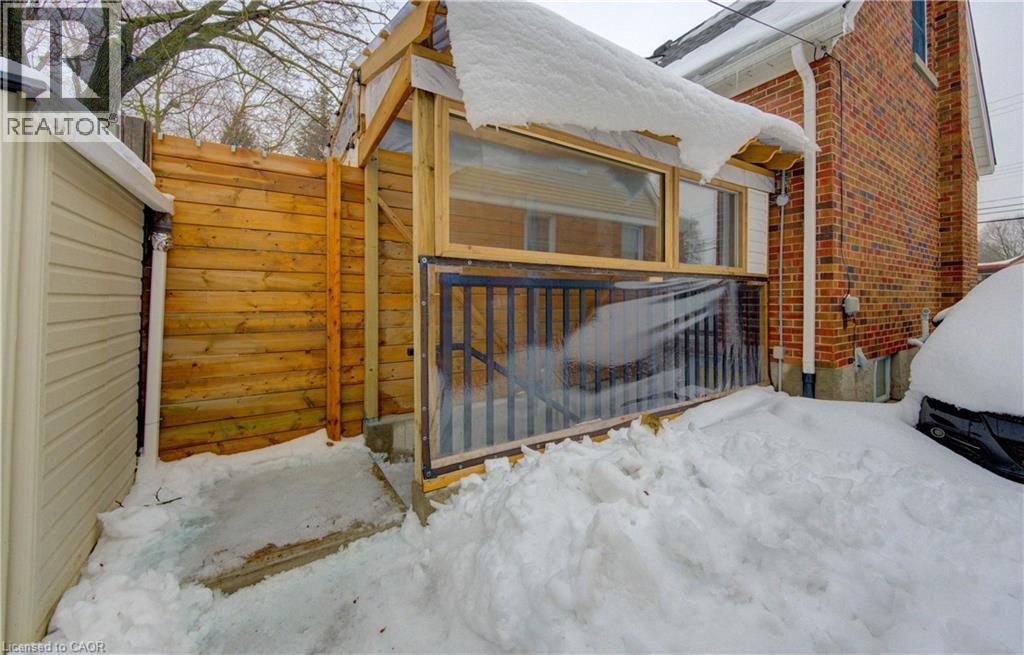 Gate with a wooden deck - 569 Stirling Avenue S, Kitchener, ON - Outdoor With Exterior