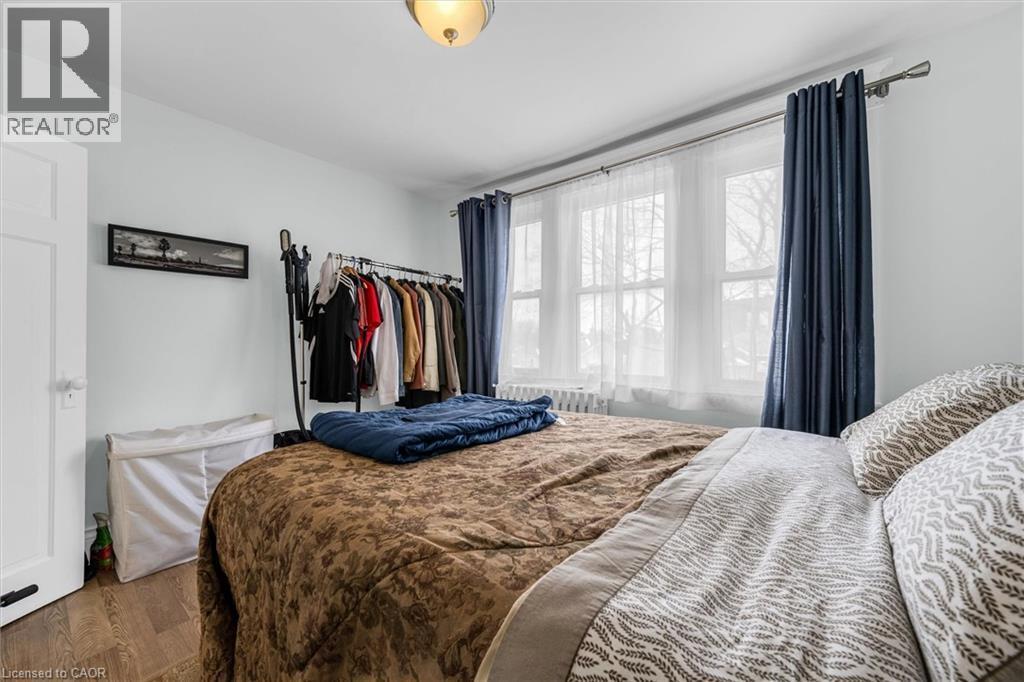 Bedroom with wood finished floors - 35 Bayfield Avenue, Hamilton, ON - Indoor Photo Showing Bedroom