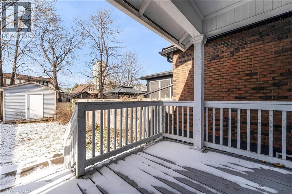 Deck featuring a storage unit and a residential view - 35 Bayfield Avenue, Hamilton, ON - Outdoor With Deck Patio Veranda