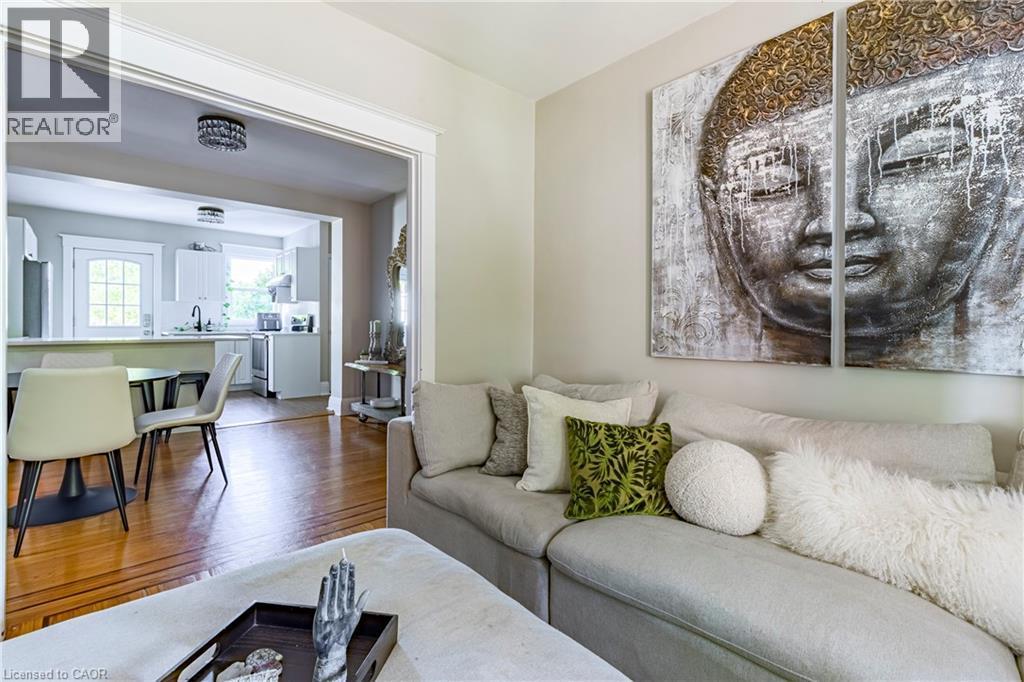 Living room featuring hardwood / wood-style floors - 58 Chatham Street, Hamilton, ON - Indoor Photo Showing Living Room
