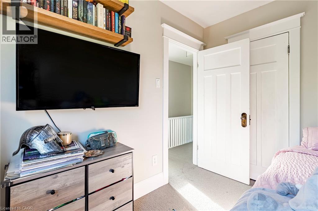 View of carpeted bedroom - 58 Chatham Street, Hamilton, ON - Indoor