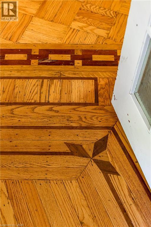 Detailed view of parquet floors - 58 Chatham Street, Hamilton, ON - Indoor Photo Showing Other Room