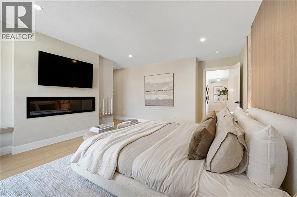452 Westhaven Street, Waterloo, ON - Indoor Photo Showing Bedroom With Fireplace