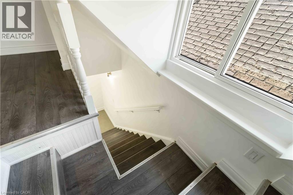 Stairway with wood finished floors - 934 Barton Street E Unit# 2, Hamilton, ON - Indoor Photo Showing Other Room