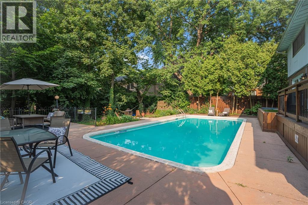 316 Fennell Avenue W, Hamilton, ON - Outdoor With In Ground Pool With Deck Patio Veranda With Backyard