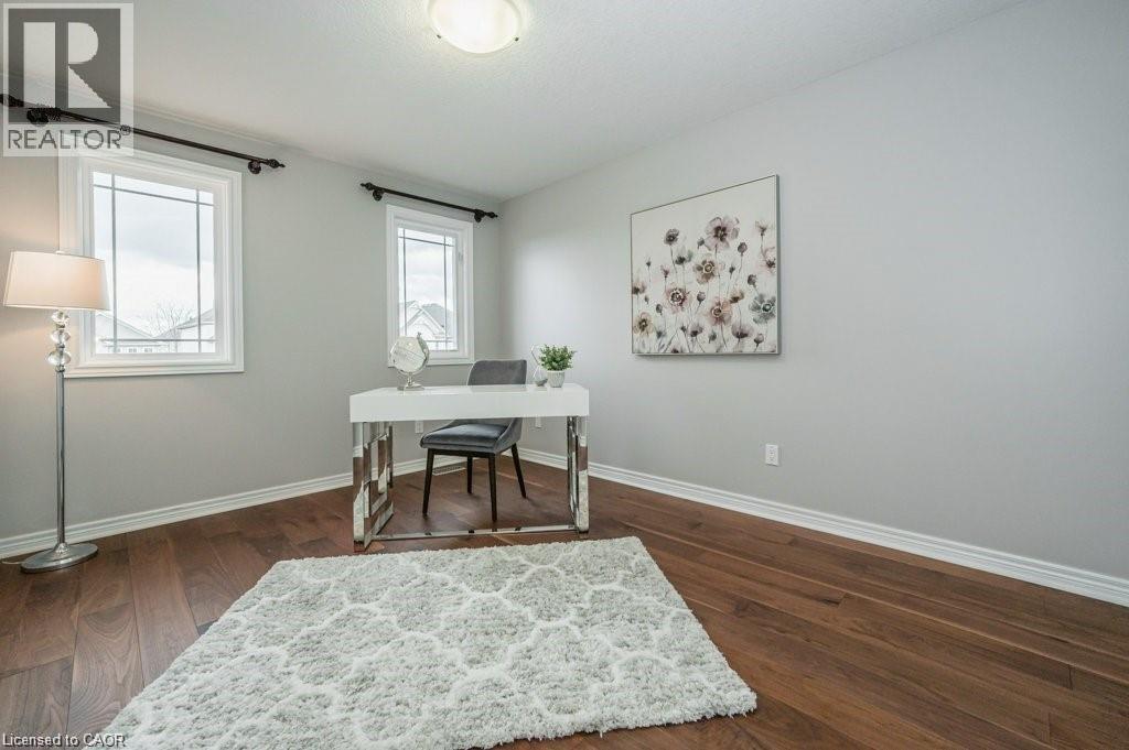 Office featuring dark wood finished floors and baseboards - 609 Woolgrass Avenue, Waterloo, ON - Indoor Photo Showing Office