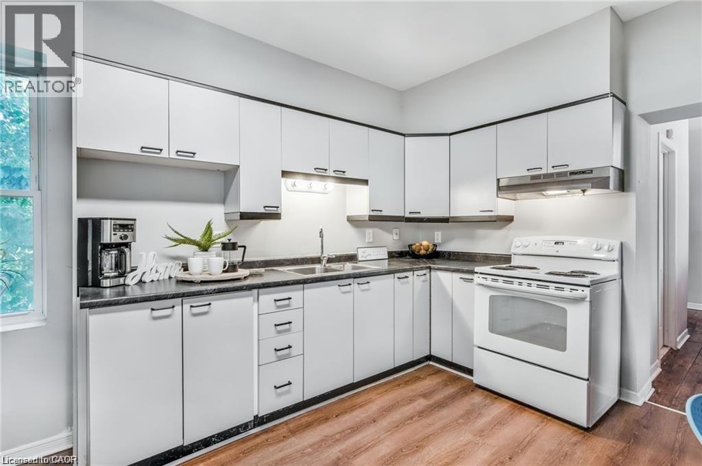 118 Queen Street S, Hamilton, ON - Indoor Photo Showing Kitchen With Double Sink