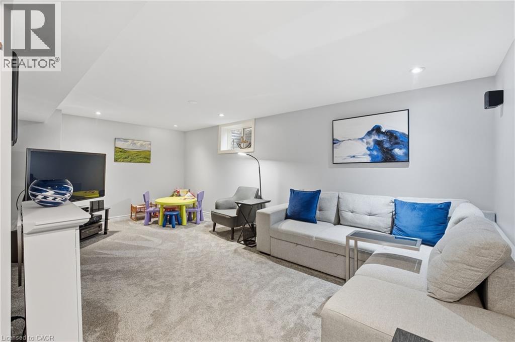 Basement recreation room with room for kids toys - 668 Tomahawk Crescent, Ancaster, ON - Indoor