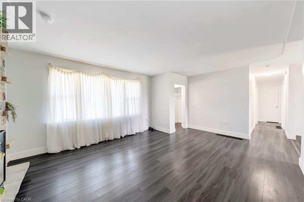 167 Miles Road, Hamilton, ON - Indoor Photo Showing Other Room With Fireplace
