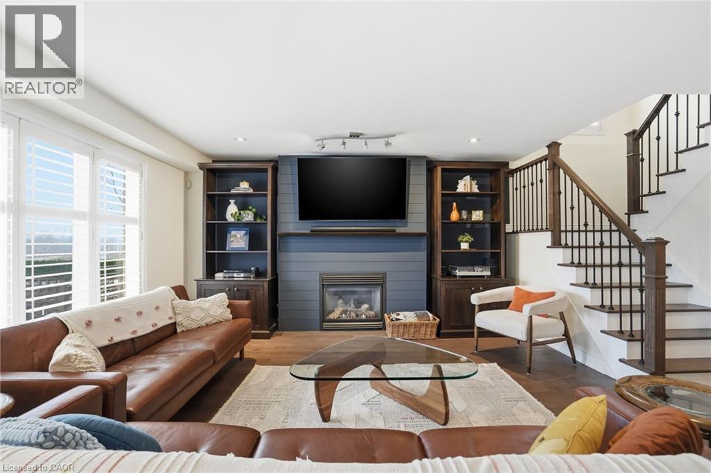 75 Etherington Crescent, Binbrook, ON - Indoor Photo Showing Living Room With Fireplace