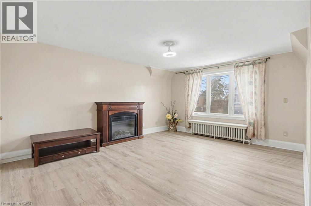 218 Weber Street E, Kitchener, ON - Indoor Photo Showing Living Room With Fireplace