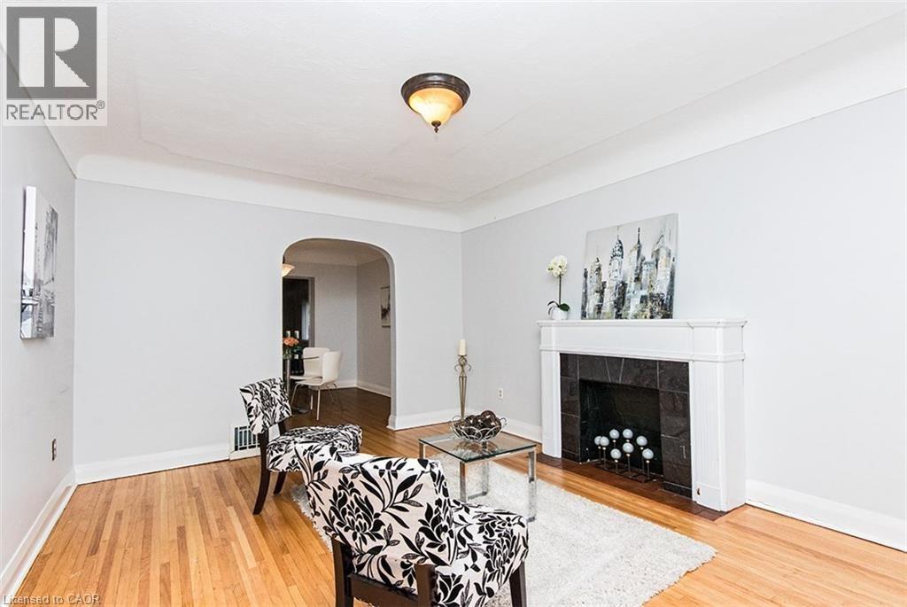 19 Gilmour Place, Hamilton, ON - Indoor Photo Showing Living Room With Fireplace