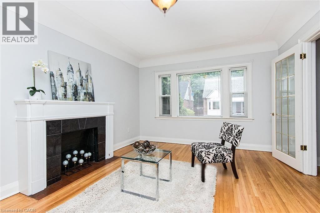 19 Gilmour Place, Hamilton, ON - Indoor Photo Showing Living Room With Fireplace