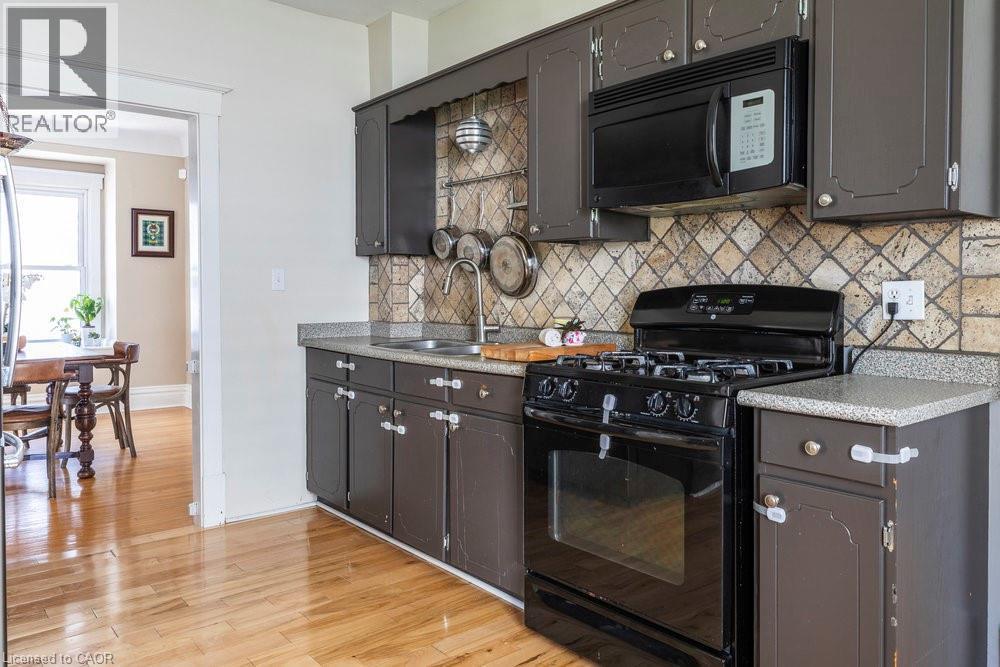65 Banff Street, Caledonia, ON - Indoor Photo Showing Kitchen With Double Sink