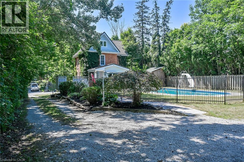 94 Sutherland Street W, Caledonia, ON - Outdoor With In Ground Pool
