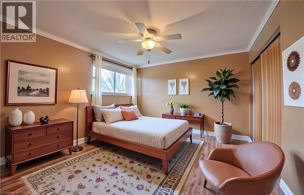 Virtually Staged - 400 Champlain Boulevard Unit# 406, Cambridge, ON - Indoor Photo Showing Bedroom
