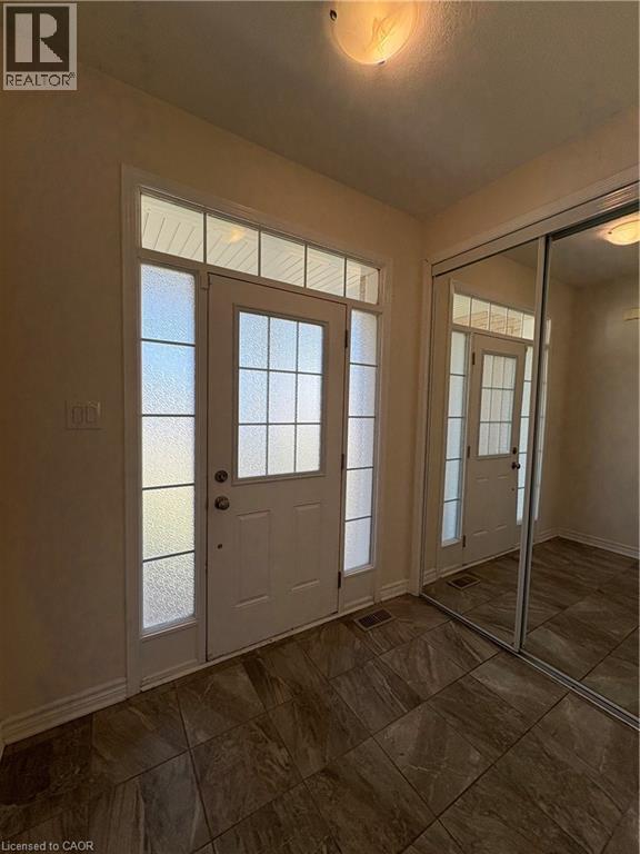 Doorway to outside with plenty of natural light - 50 Shoreacres Drive, Kitchener, ON - Indoor Photo Showing Other Room