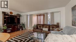 Living room with wood finished floors -