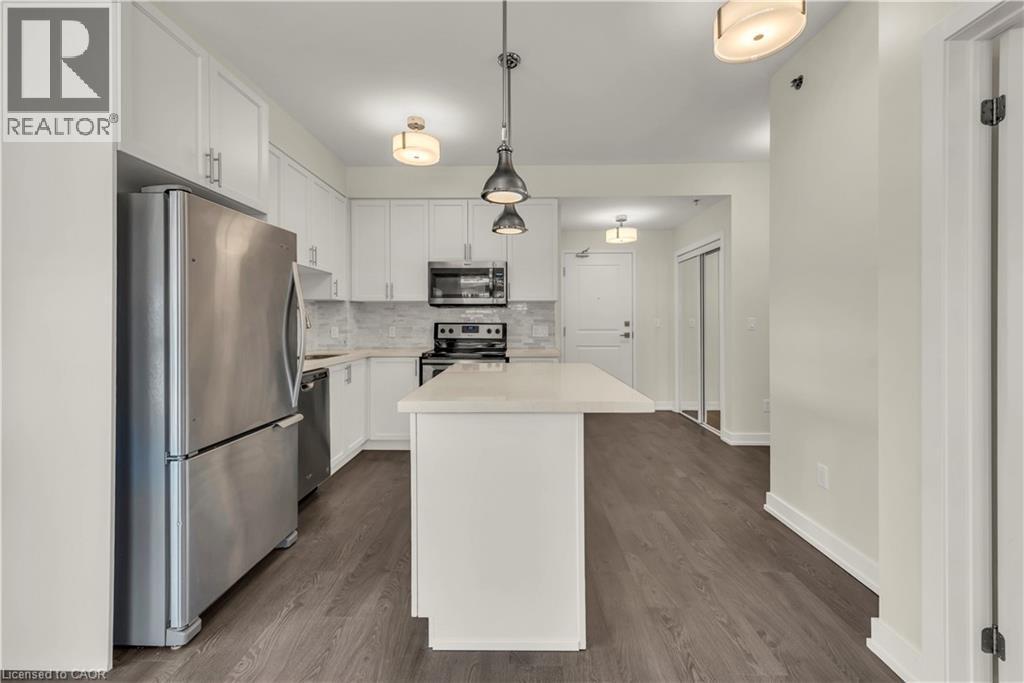 2486 Old Bronte Road Unit# 520, Oakville, ON - Indoor Photo Showing Kitchen With Stainless Steel Kitchen With Double Sink With Upgraded Kitchen