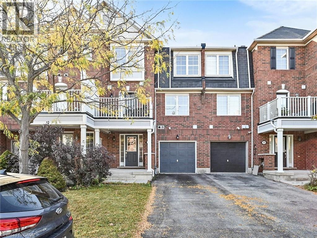 597 Speyer Circle, Milton, ON - Outdoor With Deck Patio Veranda With Facade