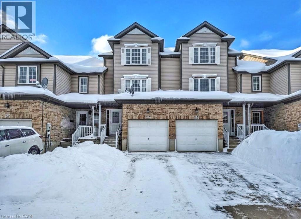 View of front of home featuring an attached garage - 206 Westmeadow Drive, Kitchener, ON - Outdoor With Facade