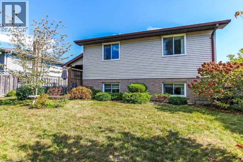 Back of house featuring brick siding - 2 Falls Crescent, Simcoe, ON - Outdoor
