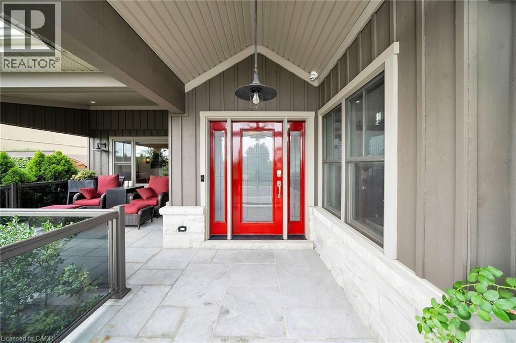 Entrance to property featuring a porch and board and batten siding - 404 Mountain Brow Boulevard E, Hamilton, ON - Outdoor With Exterior