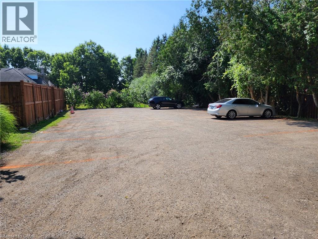 View of uncovered parking lot - 67 Old Mill Road, Cambridge, ON