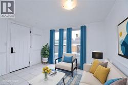Sunroom area staged featuring light tile patterned floors -