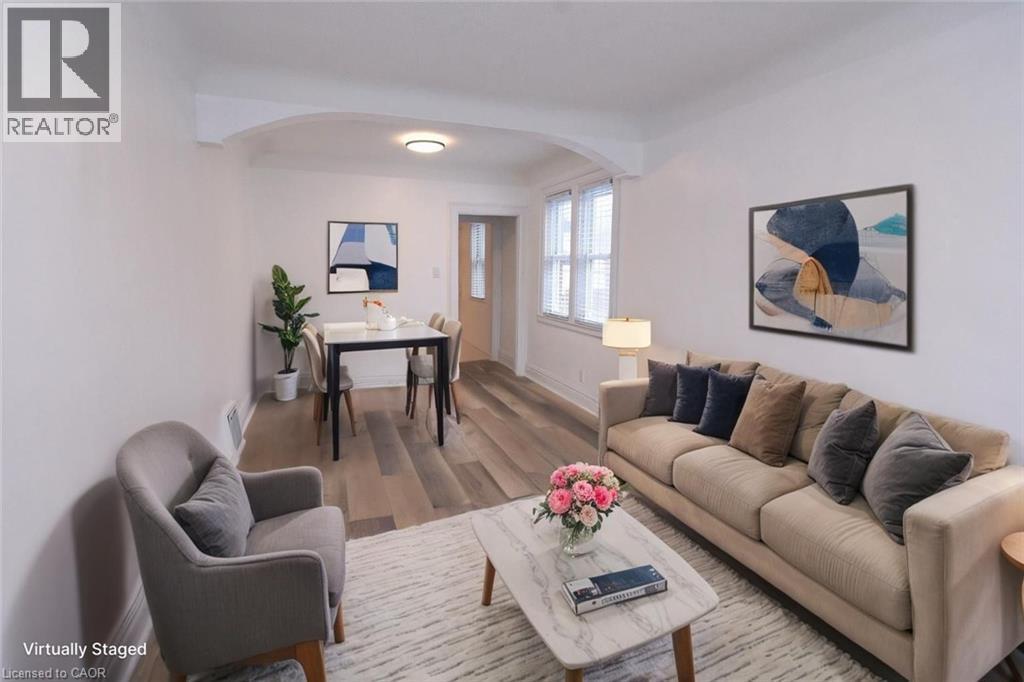 Living room staged - 215 Walter Avenue S, Hamilton, ON - Indoor Photo Showing Living Room