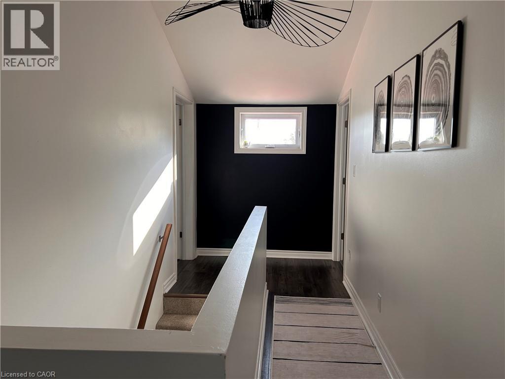 upstairs hallway - 657 Windham Road 14, Simcoe, ON - Indoor Photo Showing Other Room