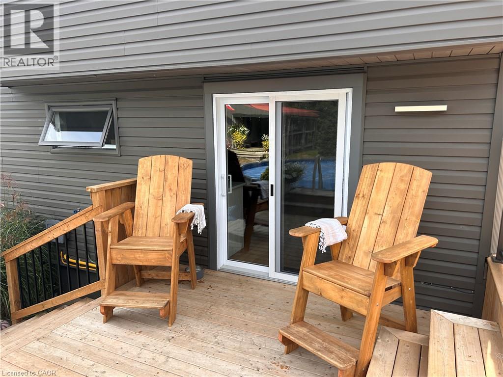 Patio doors to kitchen - 657 Windham Road 14, Simcoe, ON - Outdoor With Deck Patio Veranda With Exterior