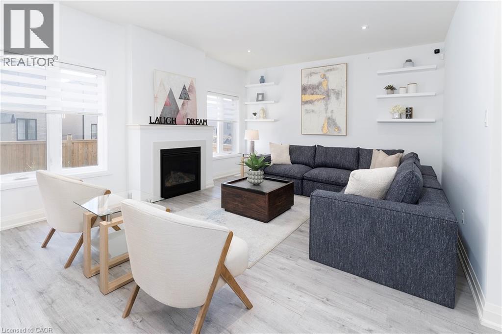 388 Klein Circle, Ancaster, ON - Indoor Photo Showing Living Room With Fireplace