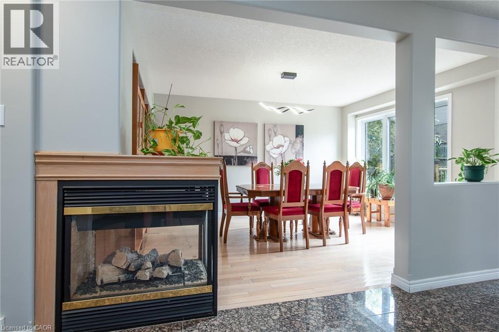 11 Apple Ridge Drive, Kitchener, ON - Indoor Photo Showing Living Room With Fireplace