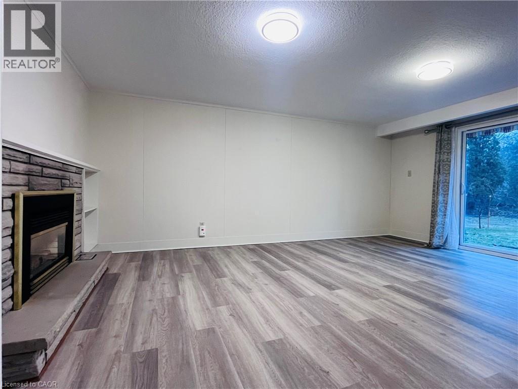 243 Appleby Line, Burlington, ON - Indoor Photo Showing Other Room With Fireplace