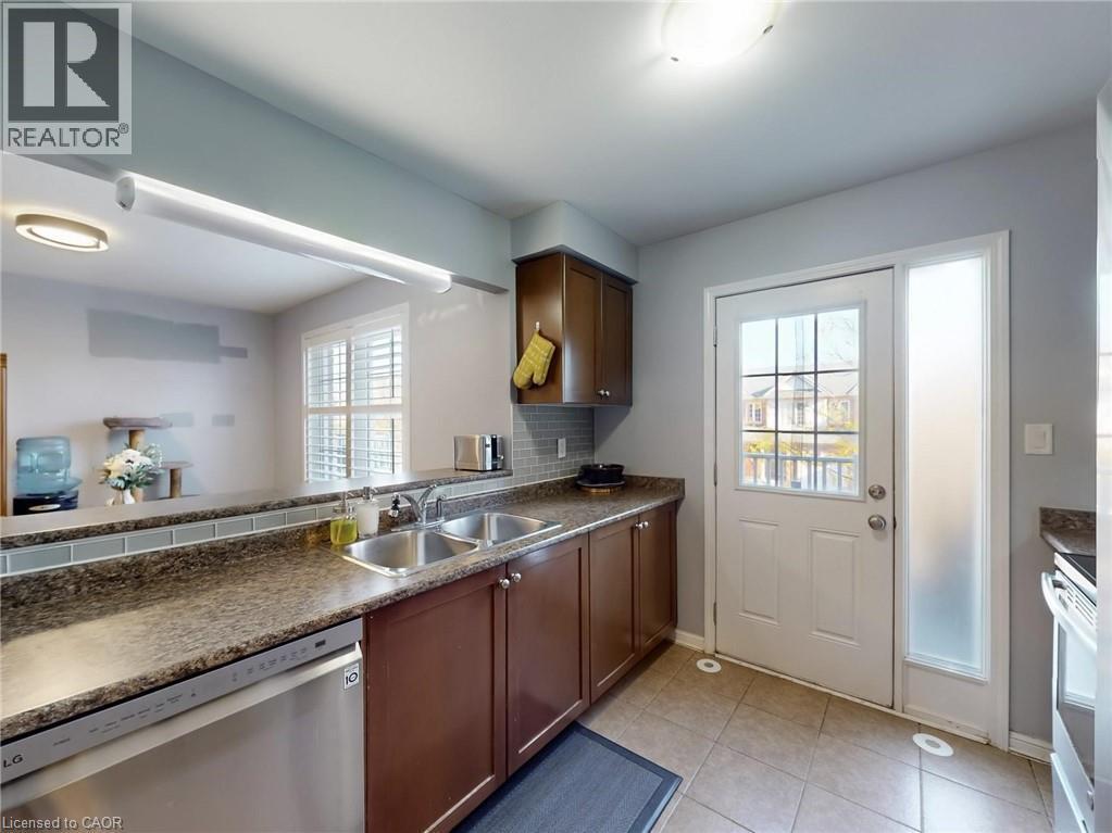 597 Speyer Circle, Milton, ON - Indoor Photo Showing Kitchen With Double Sink