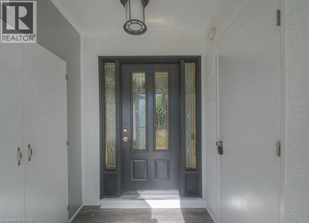 Doorway to property with stucco siding - 46 Guerin Avenue, Kitchener, ON - Indoor Photo Showing Other Room