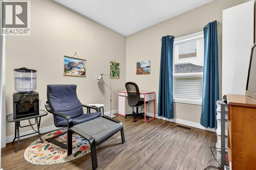 Third bedroom on the main level - 509 Riverview Place Se, Calgary, AB - Indoor