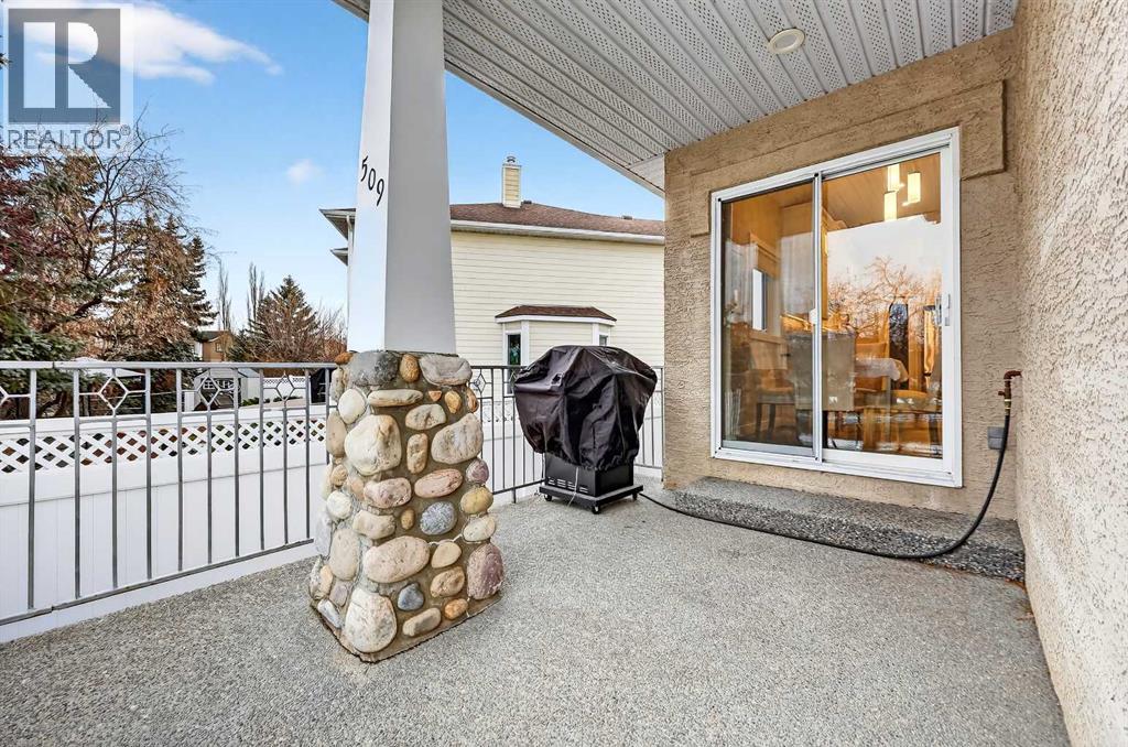 Deck off the kitchen with gas line for the barbecue - 509 Riverview Place Se, Calgary, AB - Outdoor With Deck Patio Veranda With Exterior