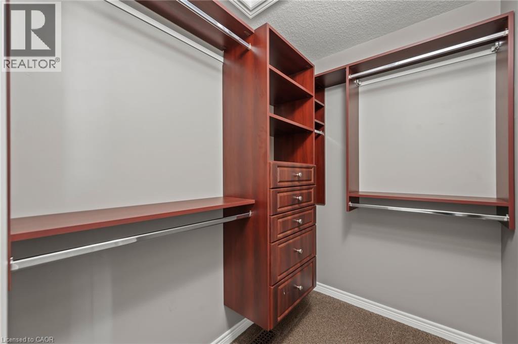 Spacious closet with dark carpet - 561 Thomas Slee Drive, Kitchener, ON - Indoor