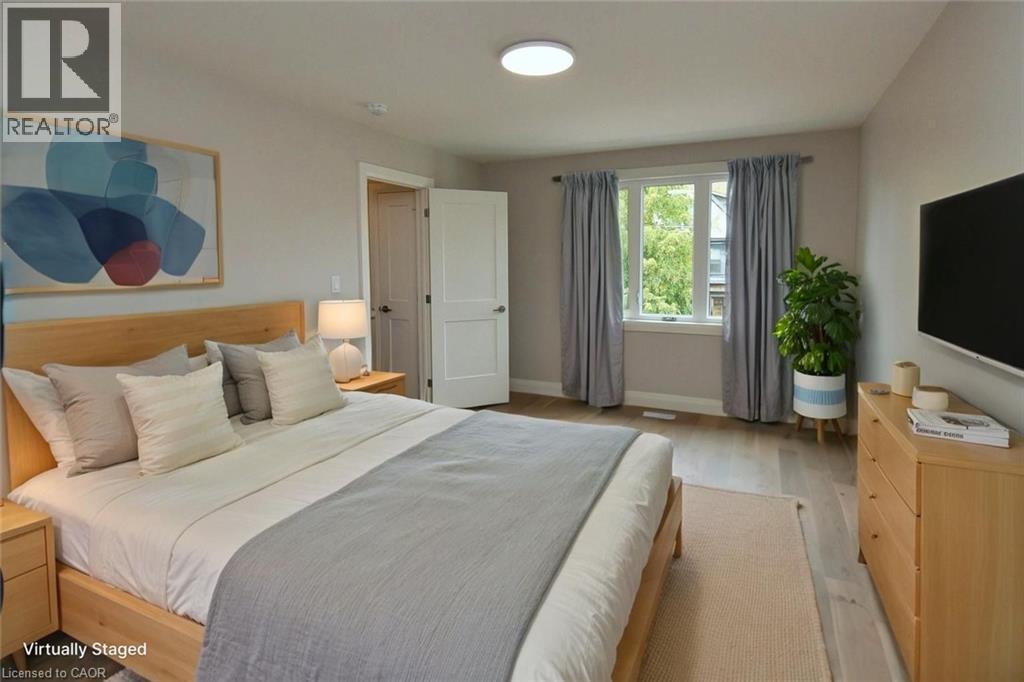 Primary Bedroom (Virtually Staged) - 279 Hess Street S, Hamilton, ON - Indoor Photo Showing Bedroom