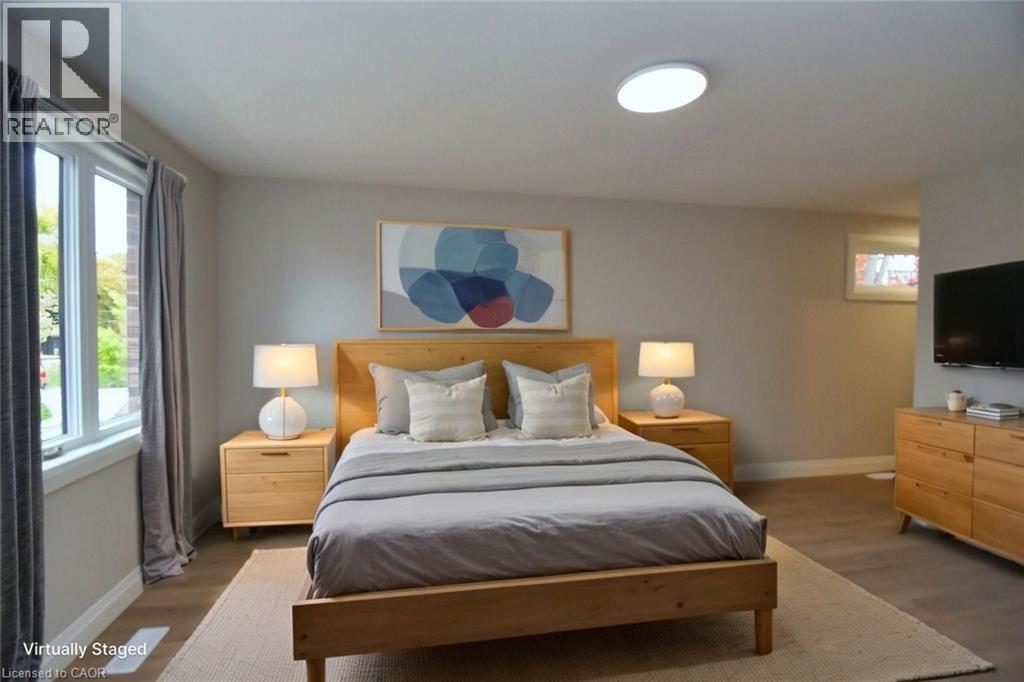 Primary Bedroom (Virtually Staged) - 279 Hess Street S, Hamilton, ON - Indoor Photo Showing Bedroom