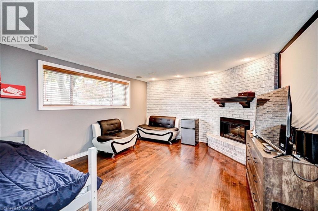 288 Salisbury Avenue, Cambridge, ON - Indoor Photo Showing Bedroom With Fireplace