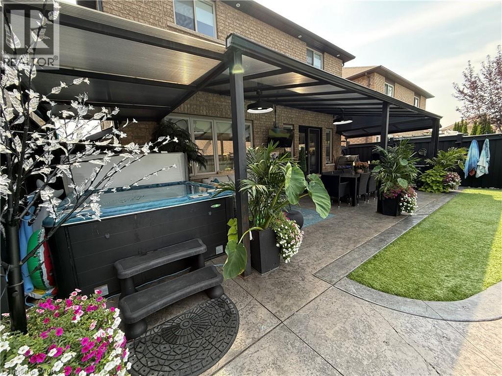 View of patio / terrace with a hot tub - 11 Donatello Court, Hamilton, ON - Outdoor