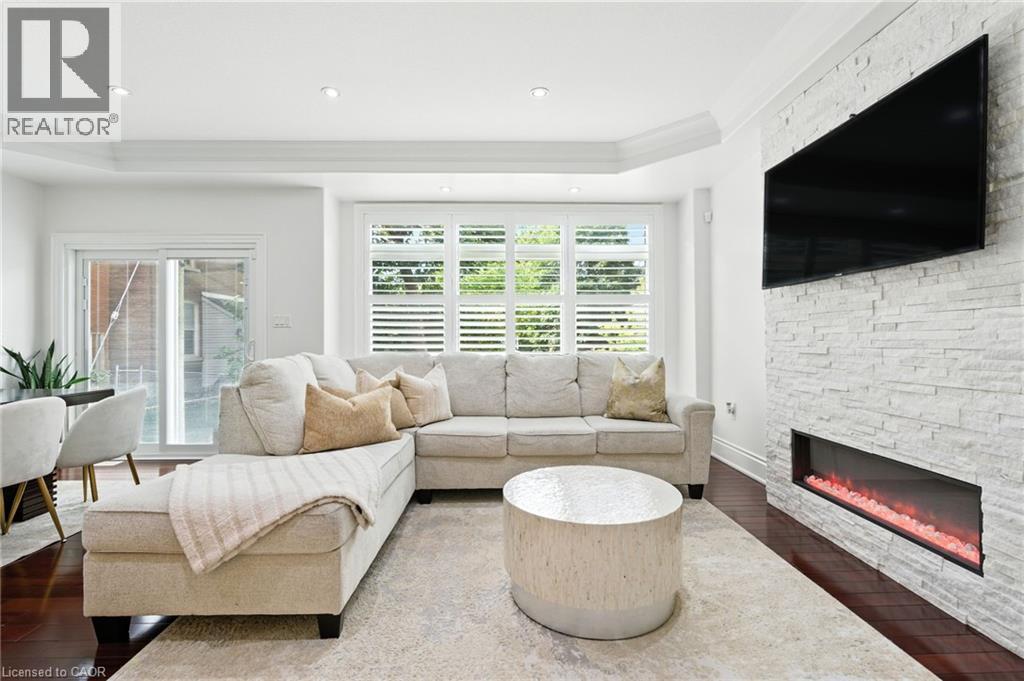 199 Hunter Street W, Hamilton, ON - Indoor Photo Showing Living Room With Fireplace