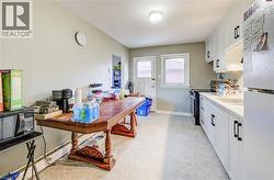 Unit 3 Eat in Kitchen renovated in 2024 with quartz countertop and vinyl flooring -