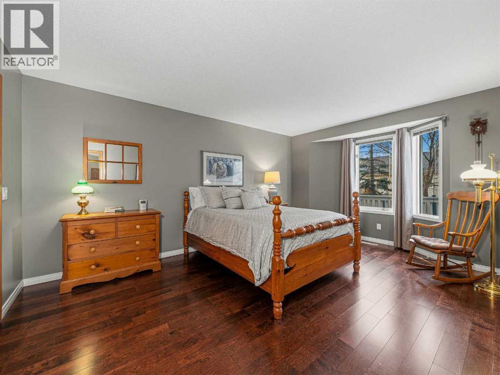 301 Arbour Cliff Close Nw, Calgary, AB - Indoor Photo Showing Bedroom