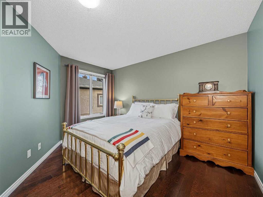 301 Arbour Cliff Close Nw, Calgary, AB - Indoor Photo Showing Bedroom