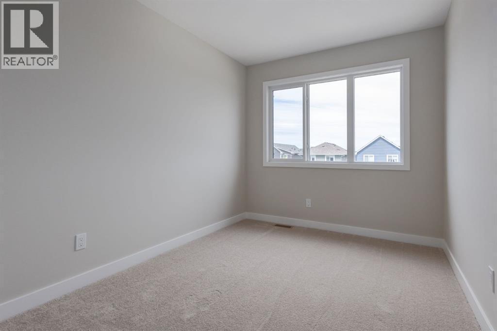 780 Sora Boulevard Se, Calgary, AB - Indoor Photo Showing Other Room